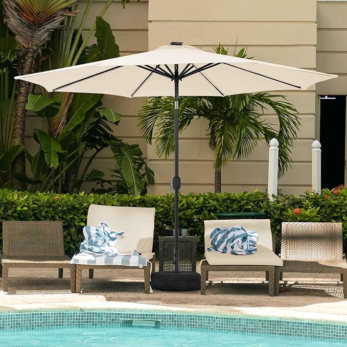 Sundale Outdoor Olefin 5-Year-Non-Fading Solar 104 LED 11FT Solar Patio Umbrella with Sand Bag Base, Outdoor Umbrella with Tilt and Crank, Beige